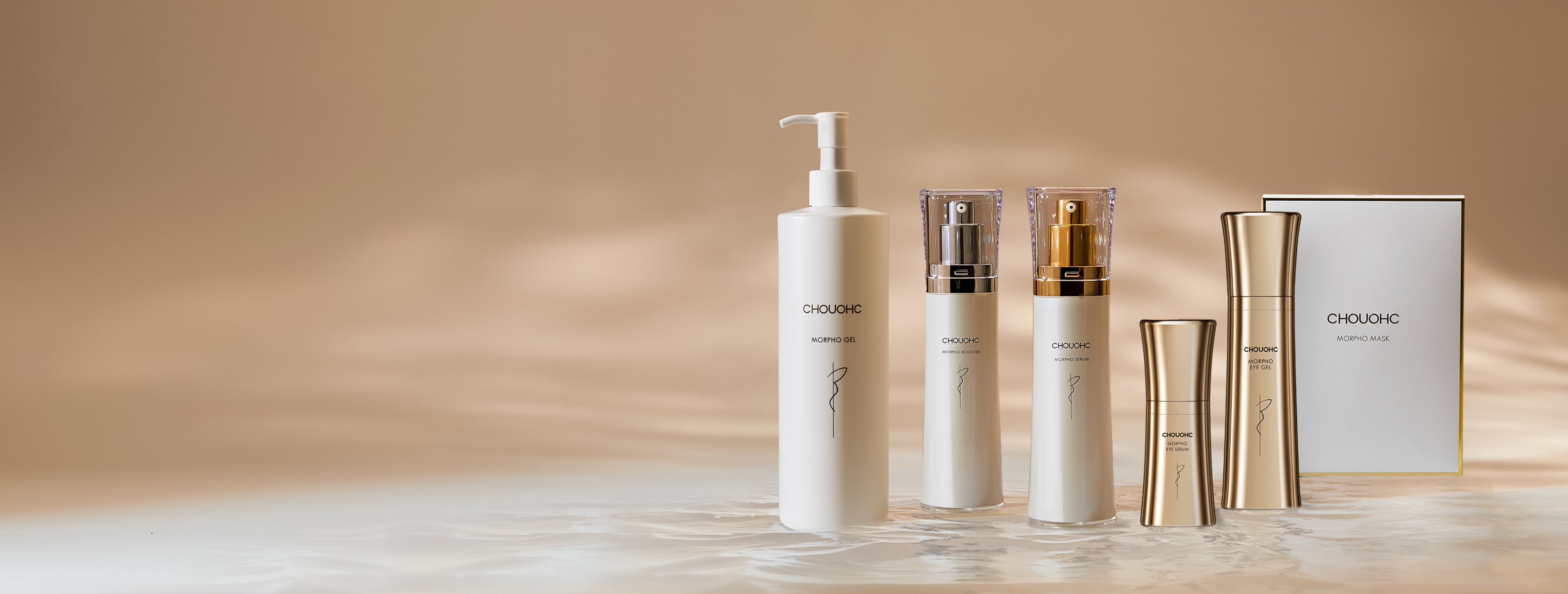 Still life of CHOUCHOU TOKYO Skincare range displayed on a watered surface, highlighting hydration as the line’s core benefit and its synergy with beauty devices.